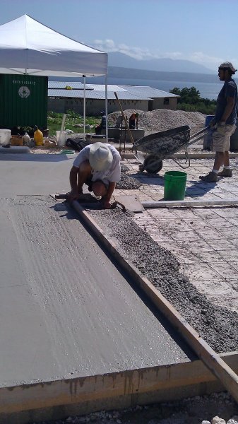 Bill working screeding the concrete