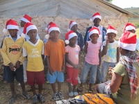 Yvrose's children sang Christmas carols for the people