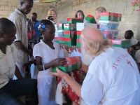 BIll passed out each gift individually to over 400 children!