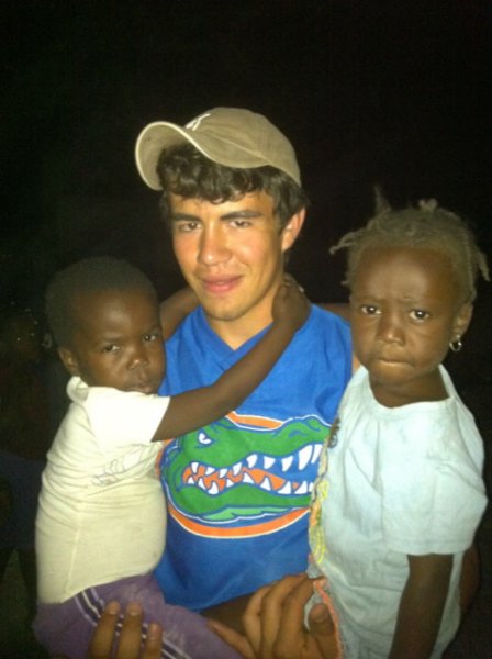 Chevo with two village children