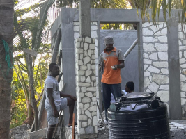 Men working on the kitchen/shower rooms