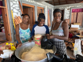The girls repackaging the food for individual families
