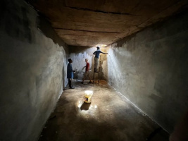 Painting the inside of the cistern to seal it