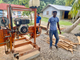 Men working with the sawmill