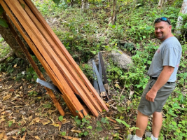 B.J. with some of the rafters that were being cut for the church/school.