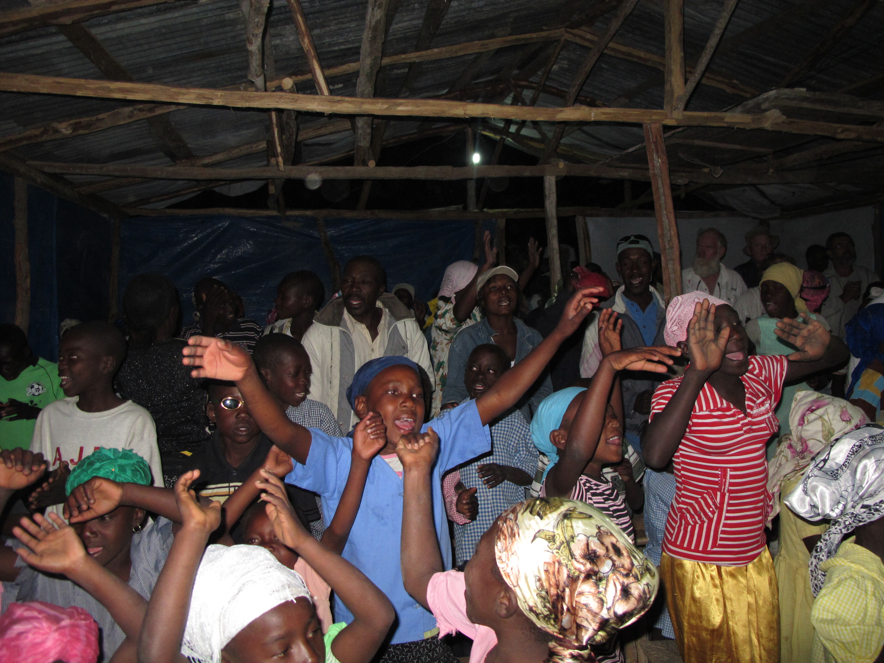 Praising the Lord with the children and people of Chapelle.