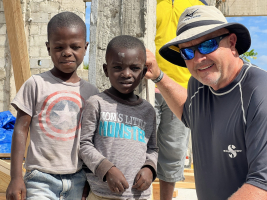 Agape CEO Allen Speers with two Haitian boys in Bedzimel