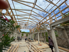 The roof of the church at Baiu de Mesle is going up!