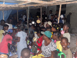 Some of the people waiting to be fed