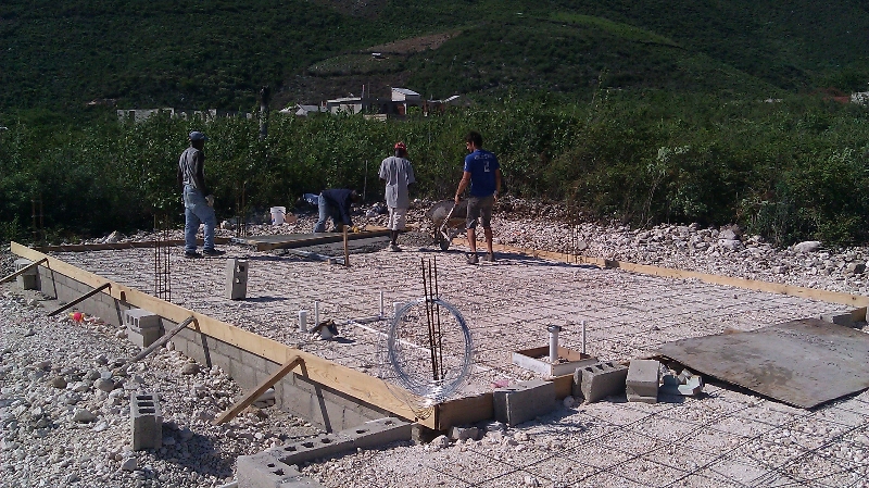 Starting to pour the flat work on the back 20x28 pad