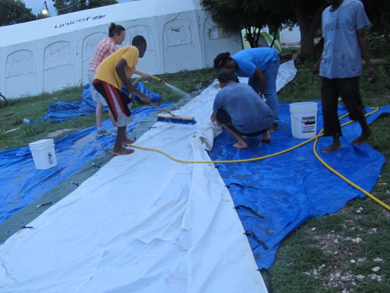 Washing up the 1st donated cholera tent.