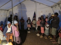 Prayer in the new cholera tent.