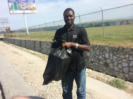 Dr. Jolius with medicine to take to the mountains for the victims of Chikungunya.