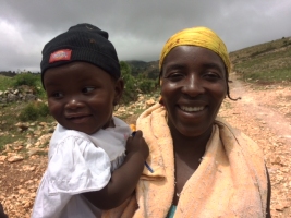 A beautiful mountain mother and her child