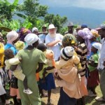 Bill passing out vitamins at the end of the clinic