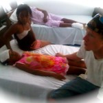 Jesse with a child at the clinic