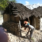 Chevo and helper working on widow’s home