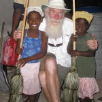 Bill with Bebi and Sontia with their new brooms which lit up their faces!