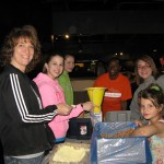 Yvrose helping pack food at Meals for Haiti in Joplin, MO