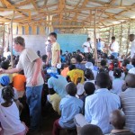 Team passing out food to the children