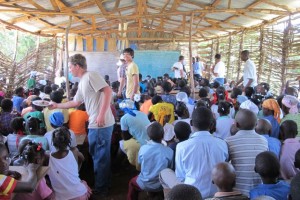 Team passing out food to the children