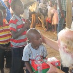Bill  handing out the gift boxes
