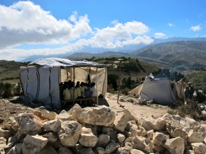 One of the Chapelle school shelters with the cook tent in the back