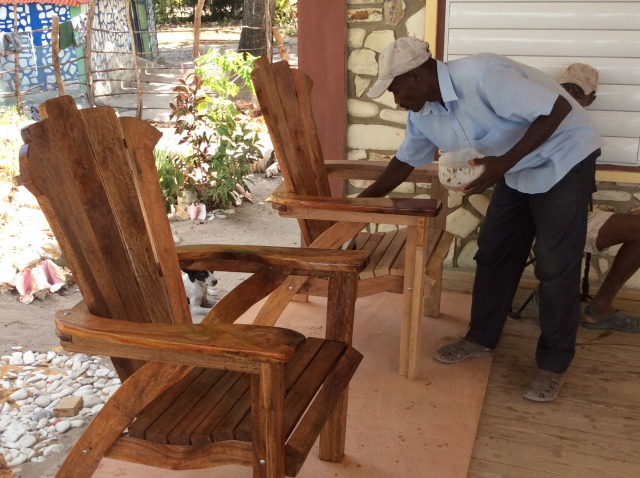 Putting a finish on the first chairs.