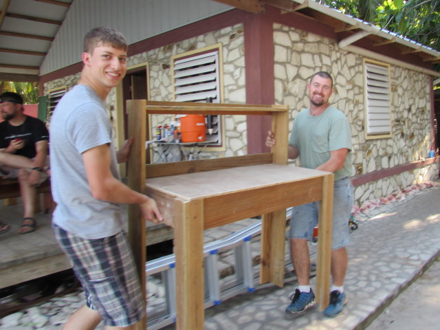 Caleb & B.J. with the new kitchen work surface