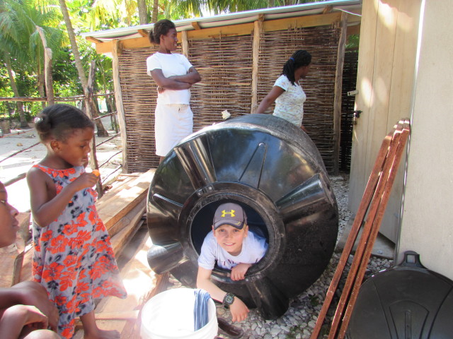 Mason helped clean out the water tank.