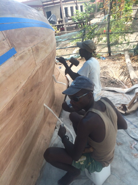 Stuffing the cotton batting into the cracks