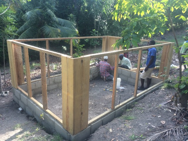Putting the chicken house components together