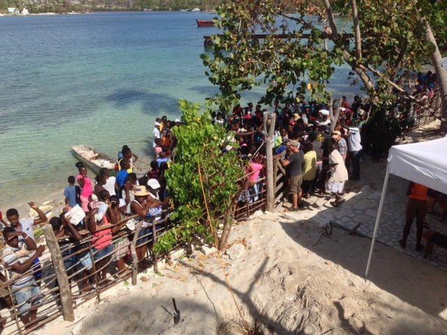 Crowd outside the gate coming for food