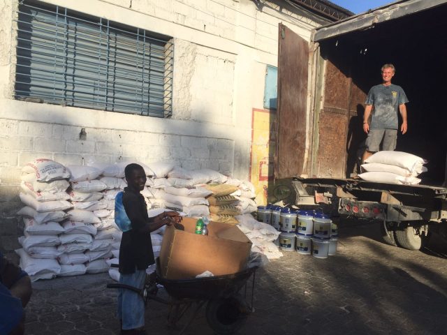 Loading the truck in Port au Prince with food supplies