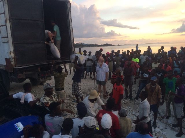 Unloading the truck by the sea